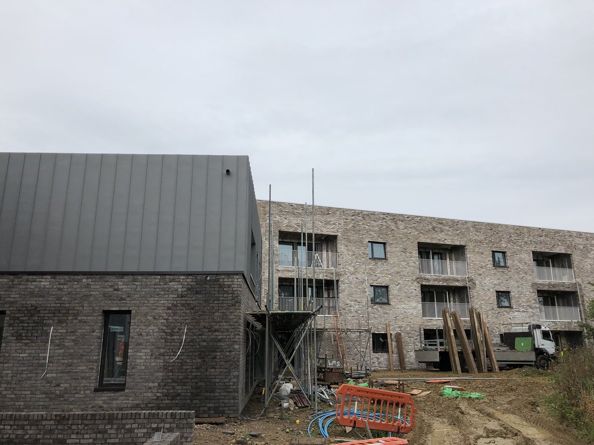 Flourish of zinc on the common house; lantern window.
