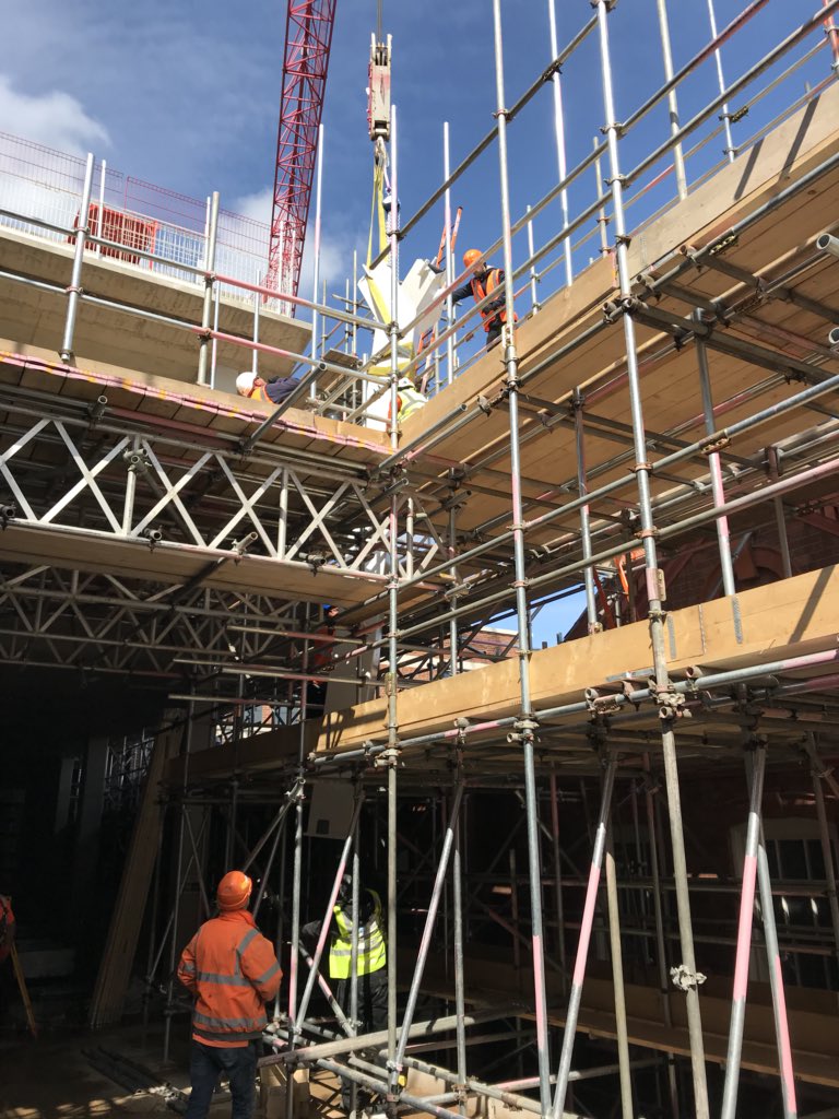 The first piece of steel for the geo-grid roof is lifted over the Mappin Building and into place in the new atrium for the Engineering Heartspace project at the University of Sheffield #engheartspace @efm_online @SheffEngEstates @IRVconstruction