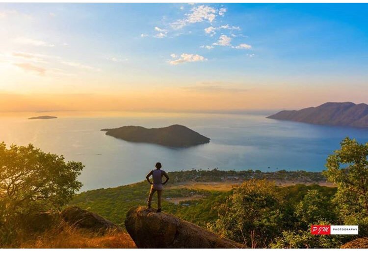 A beautiful photo of the islands of Lake Malawi National Park with Mumbo in the distance on the left, Thumbi West just offshore and Domwe on the right.
Pic <a href="/travel2malawi/">Travel Malawi Guide</a>