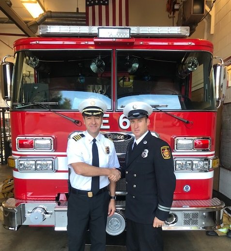 LAFDcentral's tweet photo. LAFD Central Deputy Chief Phillip Fligiel congratulating Nick Riddall on his promotion from Engineer to the rank of Captain I. Captain I Riddall has been assigned to #FireStation6 on the C platoon. #Battalion11 #LAFDCentral #UnitedFirefightersofLosAngelesCity #IAFFLocal112 https://t.co/a6TdkFSUTu