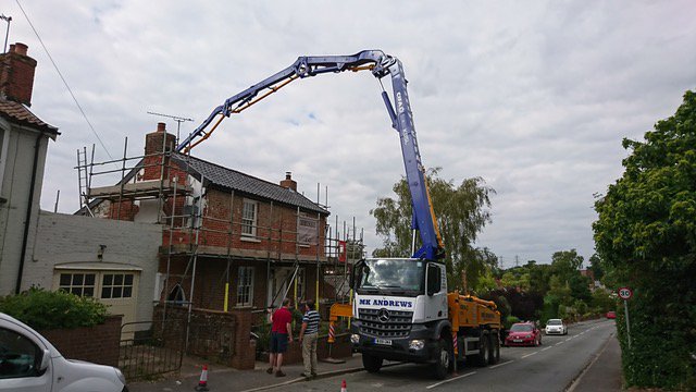 ECritchleyLtd's tweet photo. On a recent #building project with restrictive #access, a delivery of #concrete – necessary for #foundations –  had to be delivered over a house. It just goes to show that no place is inaccessible with the right ‘can do’ approach. https://t.co/ImaiXh9iJT https://t.co/4Q9sbwyCHF
