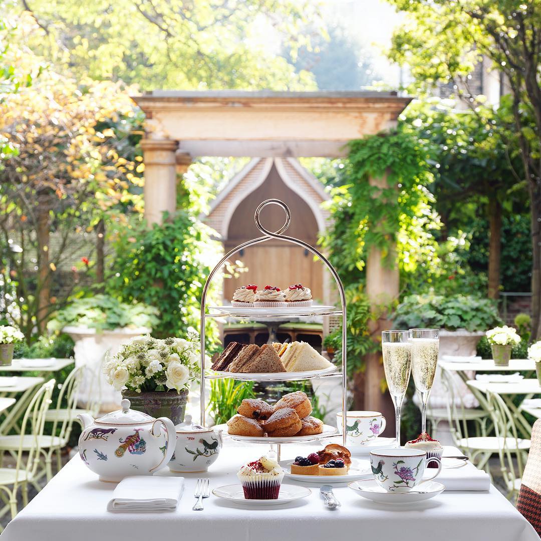 Wedgwood's tweet photo. There's always time for tea and always room for cake 🍰 Afternoon tea served on Mythical Creatures from Kit Kemp for Wedgwood in @Firmdale_Hotels ☕️ https://t.co/qLckITCcCw