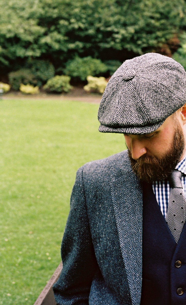 tweed jacket and flat cap