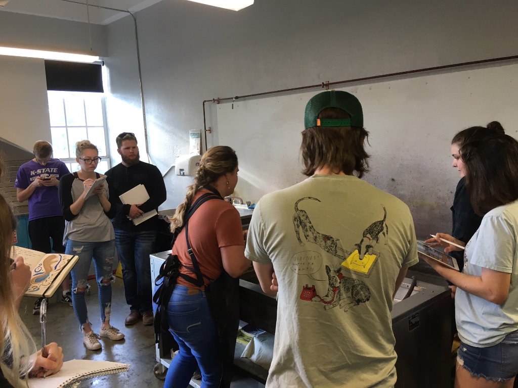KStateArtDept's tweet photo. Grad student, Hailey, gives a demonstration on stone lithography in advanced printmaking studio. #KState #artdept #art #printmaking #ART635 #stonelithography #lithography #studioart #alwayslearning #createsomethingneweveryday https://t.co/OTLjz5fkMM