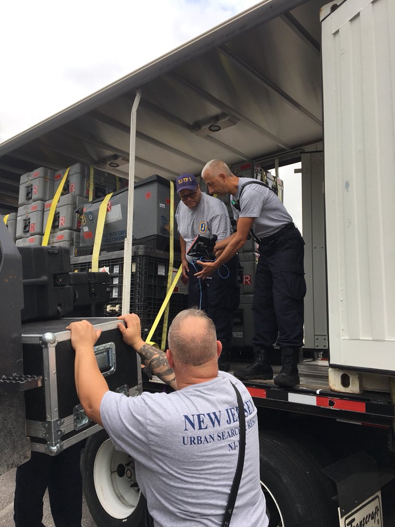 USAR team members unload truck