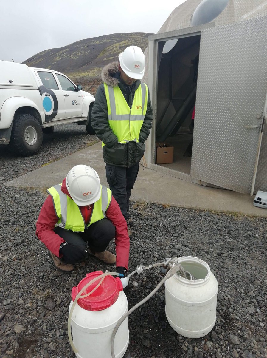 IntCarbonConf's tweet photo. Reykjavík Energy employers, Fríða and Þorsteinn, show a group of Metal-Aid summer school students high temperature geothermal well fluid sampling https://t.co/aqLLiO7W0G
