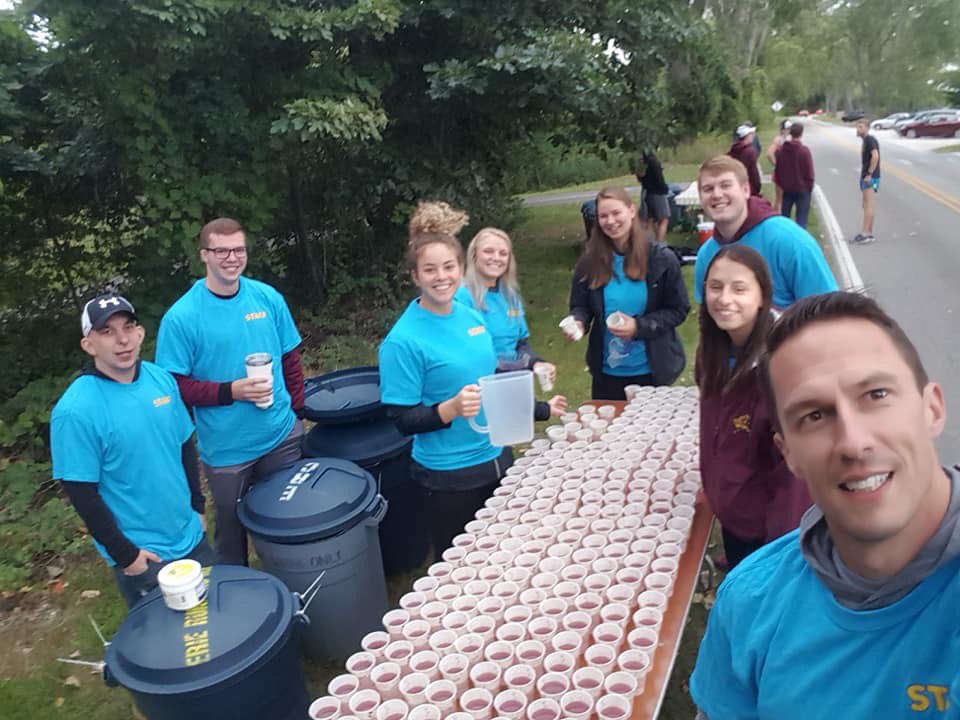 GannonUSPRT's tweet image. This past Sunday Dr. Kory Stauffer led a group of GUSES students in a volunteer experience with the @ErieMarathon. Our students, along with Dr. Stauffer, manned a water station and cheered on the athletes as they came by. #GUSES #sweatscience #MarathonTweets #service #eriepa