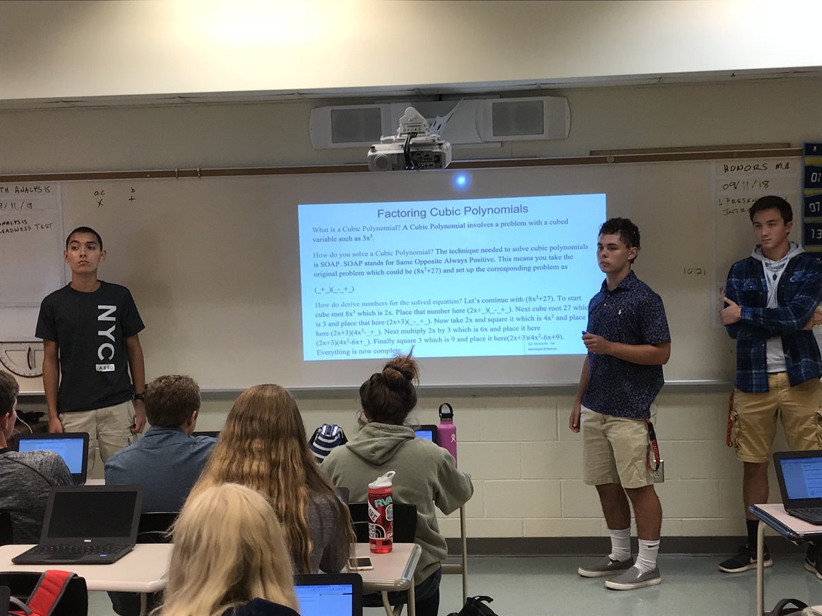 PowhatanHS's tweet photo. Math Analysis students in Mr. Forstner’s class busy answering questions from their peers while teaching their classmates factoring cubic polynomials. #Communication #CriticalThinking #TeacherSupported/StudentLed #WeArePHS https://t.co/LPH2F62nBC