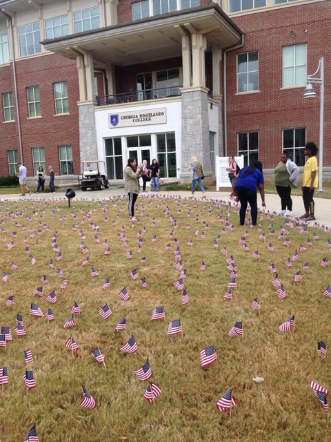 GaHighlands's tweet photo. GHC’s Student Veterans of America placed 2,977 flags across campus today to represent each victim of the attack on September 11, 2001. #NeverForgetProject #TakingCharge https://t.co/gOe266gssJ