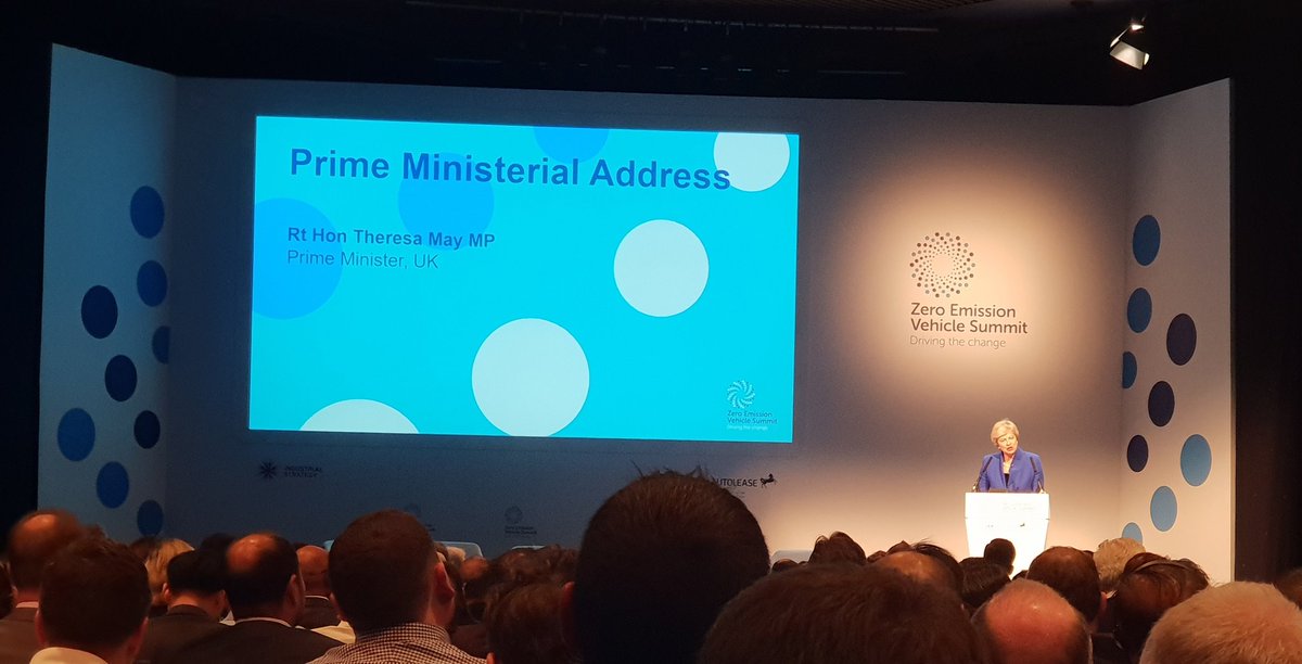 DrBobMoran's tweet photo. At #ZEVsummit @theresa_may @10DowningStreet reiterates the world is on the 'brink of a green transport revolution' the UK is determined to lead. Extraordinary #innovation is reshaping our future mobility and delivering #cleangrowth.  #IndustrialStrategy #BirminghamDeclaration https://t.co/VmsgtXyCHy