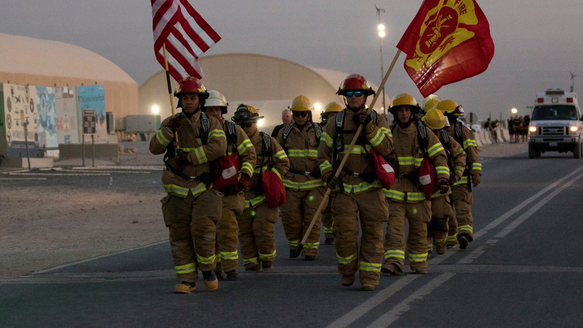 Firefighters stationed at Camp Buehring, Kuwait, march in full gear to commemorate the 17th anniversary of #September11th. Today, as in 2001, the <a href="/USArmy/">U.S. Army</a> stands ready to answer the nation's call 🇺🇸 #NeverForget