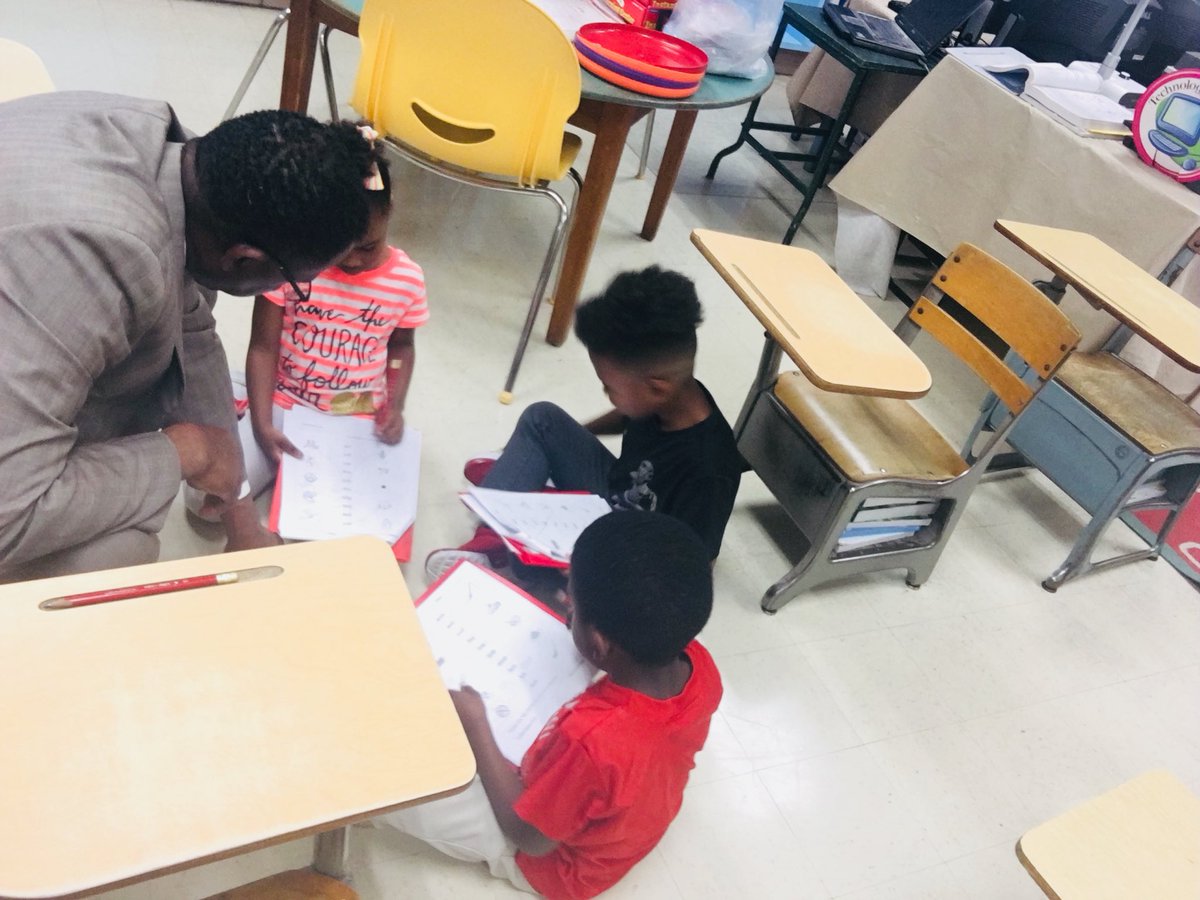 WEStriplin's tweet photo. A picture is worth a thousand words. Superintendent Mr. Reddick visited W.E. Striplin Elementary today. He spent time talking with W.E. 1st graders about their assignment. Thank you Superintendent Mr. Reddick @gcstitans https://t.co/CKLSUN78Zd