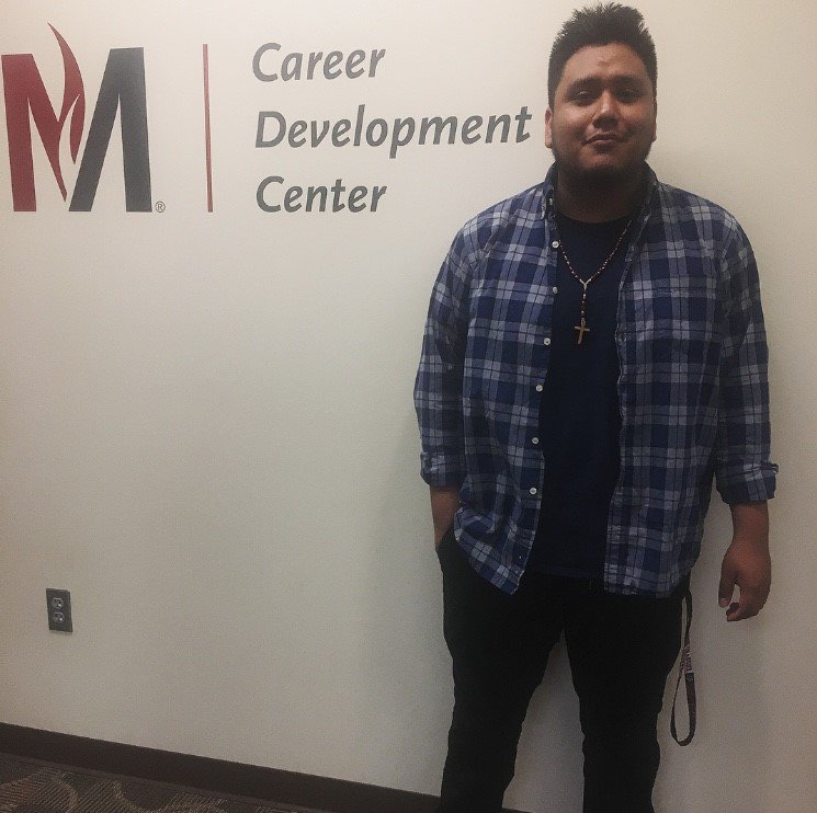 MSUMCDC's tweet photo. #MeetOurStaffMonday Meet Dio!        I’m excited to work at the CDC as a Student Consultant because I enjoy talking to people, and helping them. I’m also excited in getting to know the rest of the CDC staff.  #MSUMCDC #MSUMoorhead #DragonPride #MSUMGrit #MSUMHumility #MSUMHeart https://t.co/Wd6fk3RW1h
