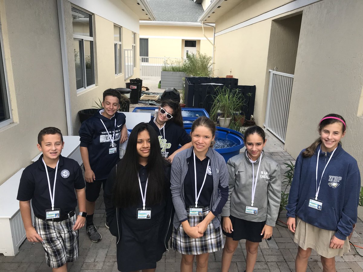 MissNiss13's tweet photo. All smiles on our first day of gardening in 7th grade! Today was labor intensive- Sifting through compost to have nutrient rich soil, pulling weeds and learning about our new aquaponics system #LPALove https://t.co/c18VeOjaJV