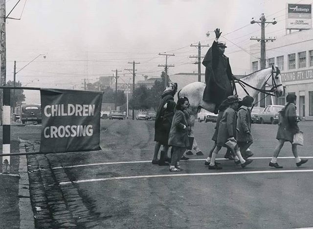 BubNames's tweet image. Constable Bob Hore on duty at the school crossing on the corner of Moray and Napier Street, South Melbourne, 1968 .. #melbourne #ozhistory #police #kids