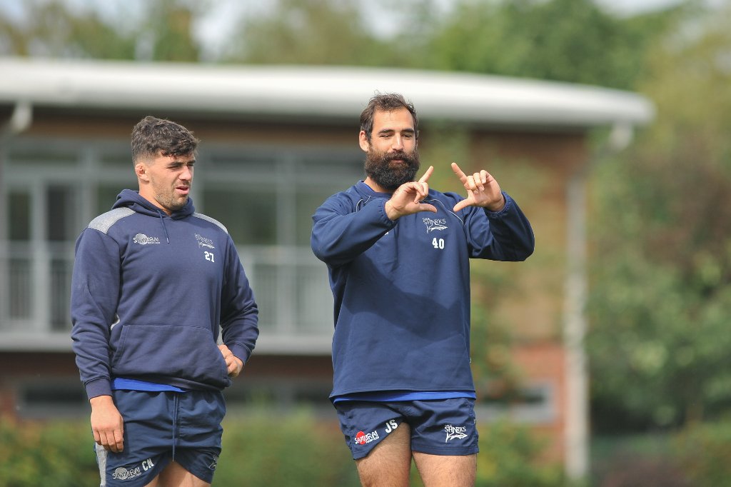 SaleSharksRugby's tweet photo. CAPTION TIME!  🦈👀💬 
What's @JoshStrauss1 showing @cameron_neild here!?

The best answer will feature in our next programme!
#SharksFamily #CaptionTime https://t.co/CDrDP4GPQn