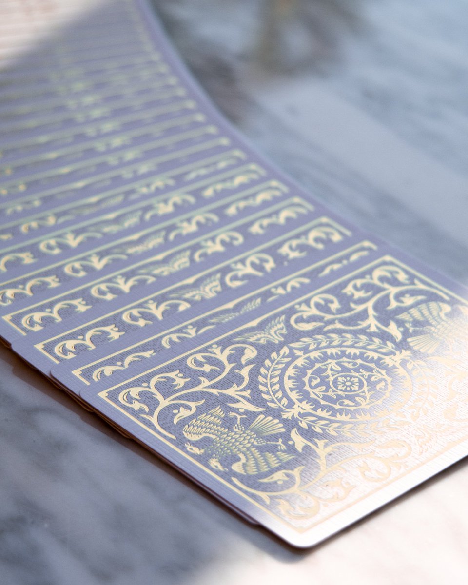 KiingofCards's tweet photo. White Regalia by @shinlimmagic manages to feel even more opulent and prestigious than its predecessor. Quality is sublime and the pearlised white tuck boxes enclose stunning individually gold foiled playing cards printed by @cartamundicards 👑 Available in our store! 👸🤴 https://t.co/IxIlYNbZoh