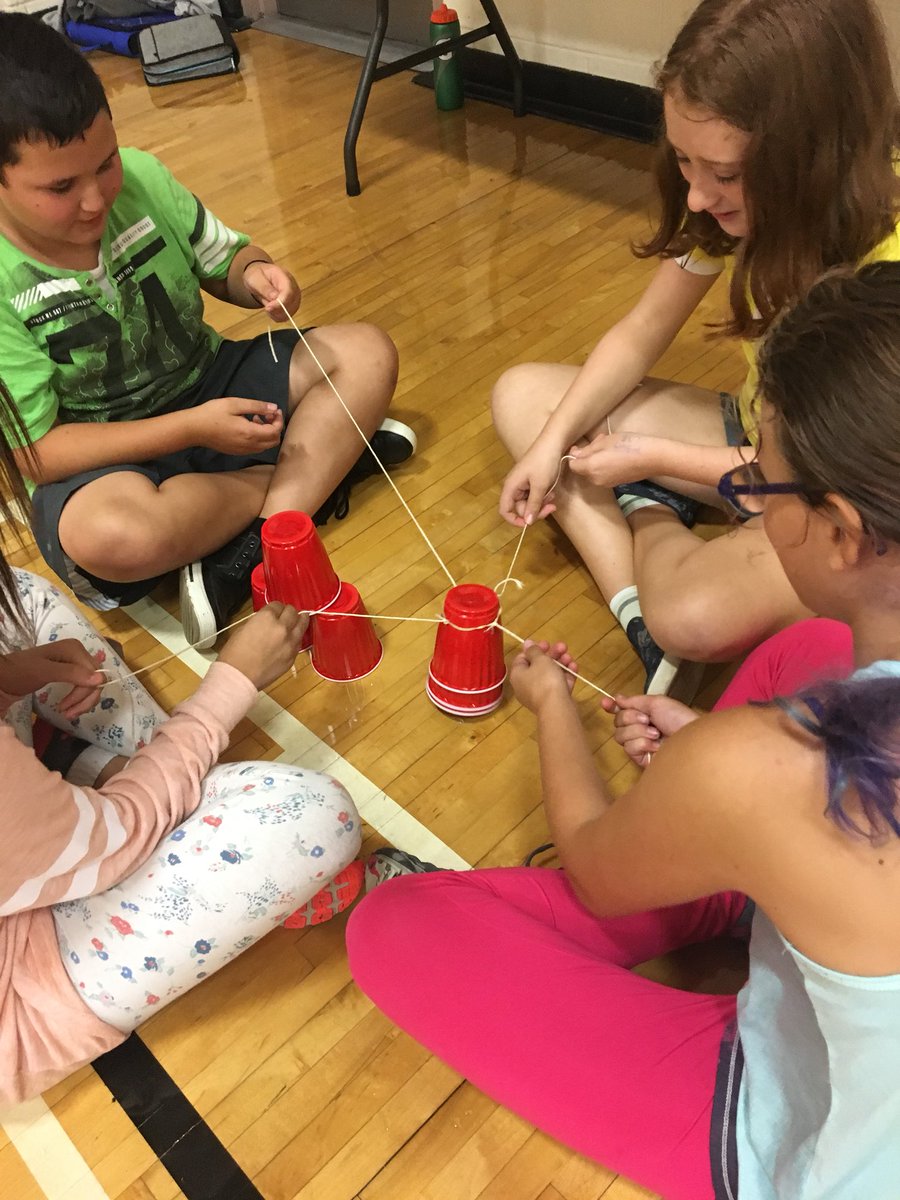 MrsDulhanty's tweet photo. Cooperative Games time!! Students are working together, problem solving, and having fun! @GCJHWildcats #toxicwaste #groupsign #heliumstick #cupstack https://t.co/w3KdYIbzjD