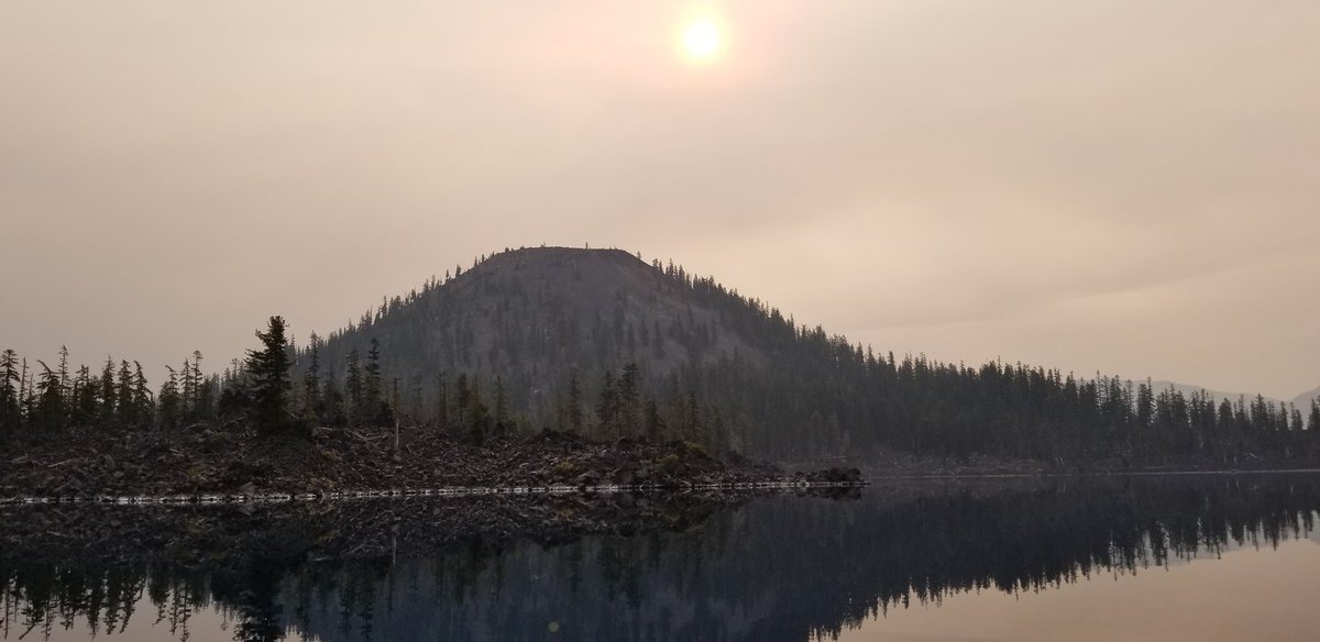 NomaditAgain's tweet photo. We made it to wizard island on a fairly smokey day. Hiked to the top and played some MTG inside the witch's cauldron @wilderness_wandering ... it was awesome! Stood inside a volcano inside a volcano, epic.
#craterlake #craterlakejobs #wizardisland #caldera #nomaditagain https://t.co/8RBvilXrOX