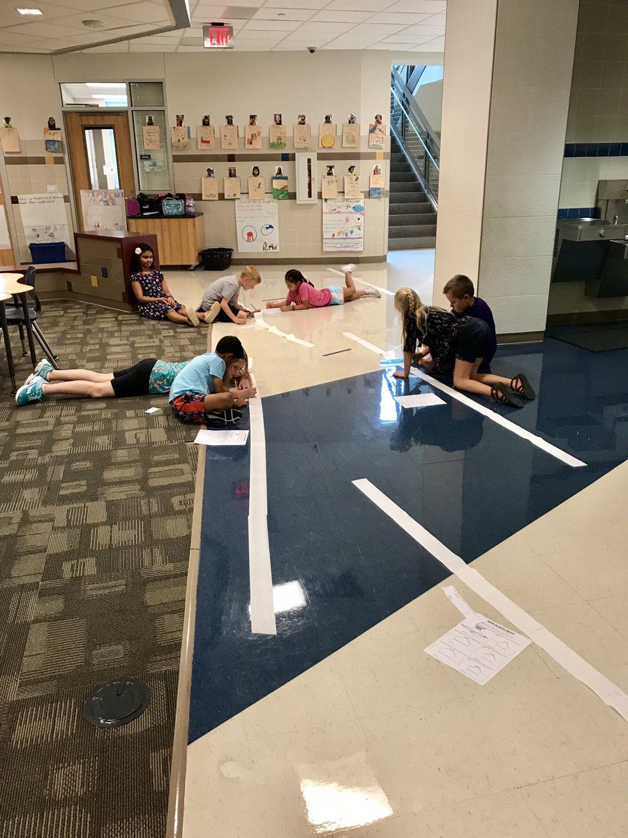 Placing numbers and practicing our rounding on our self made number lines! #MathKISD #MathPeople