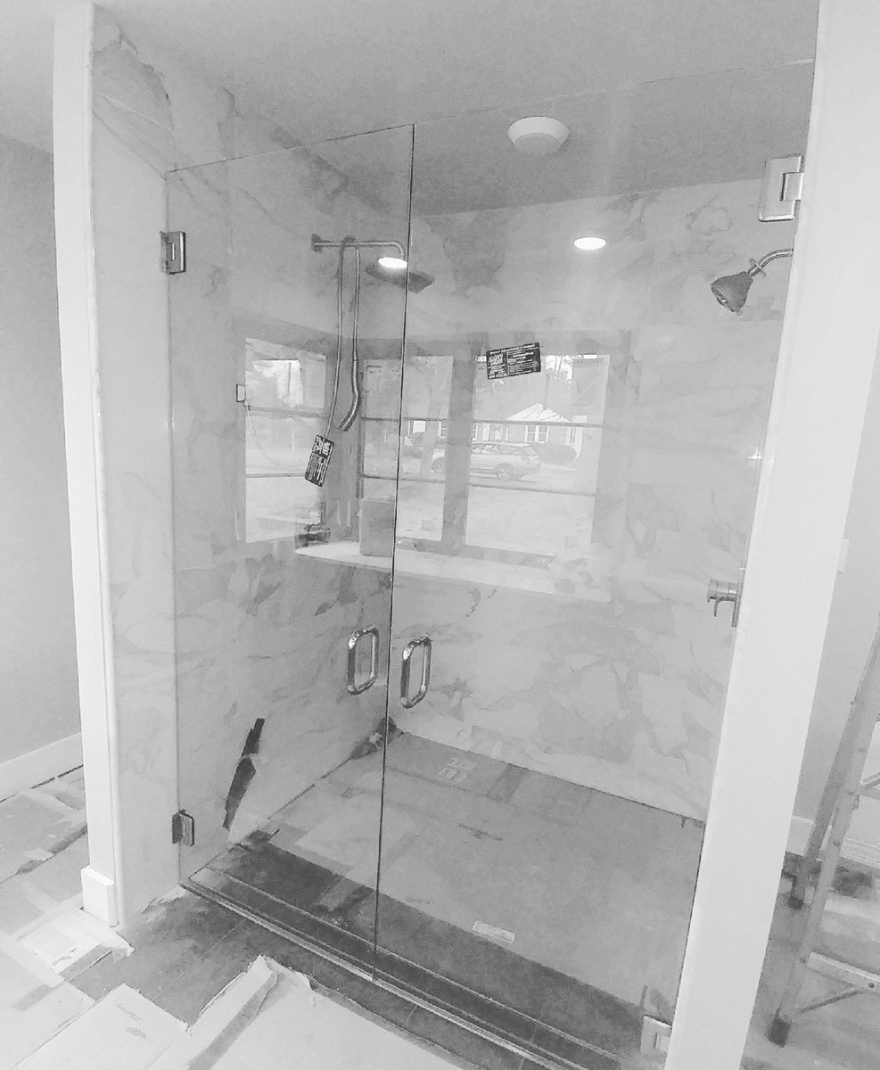 BTglass1960's tweet photo. Open up your space. Double door frameless shower enclosure. #brittandtilsonglass #asheville #showerenclosure #framelessshower #headerless #showerdoor #WNCshowerdoor #glassshower @coastalliving https://t.co/DNgQx3vx8n