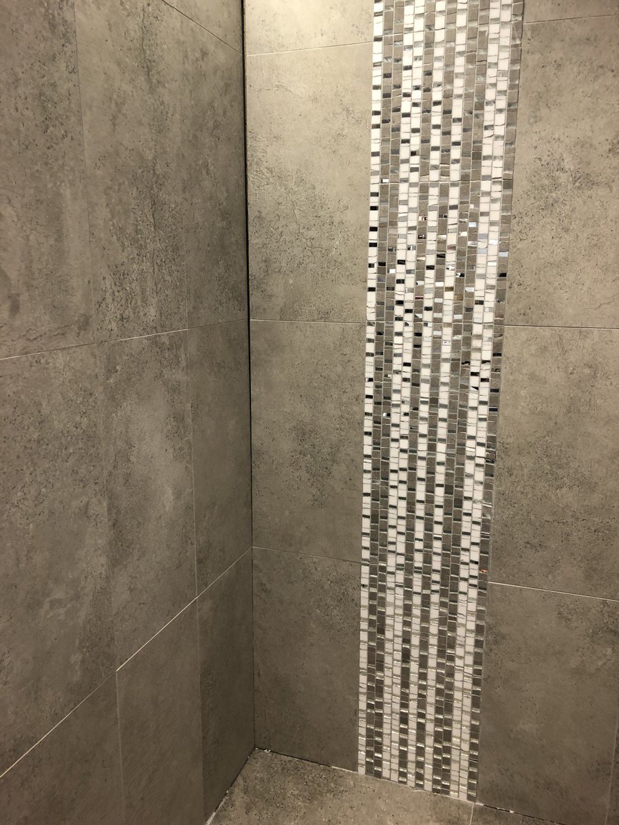 Metallics are definitely on trend this year. Add a strip of porcelain mosaic with hints of metallics in your shower, to instantly add opulence. 

#interiorideas #interiorhome #interiorarchitect #metallics #mosaic