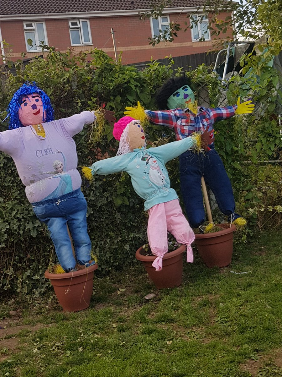 Kids scarecrows they have made at the hens