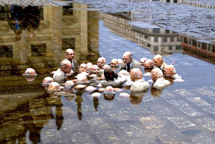 swami2005's tweet image. There is a sculpture in Berlin titled 'Politicians discussing global warming'. 

Artwork by Isaac Cordel.