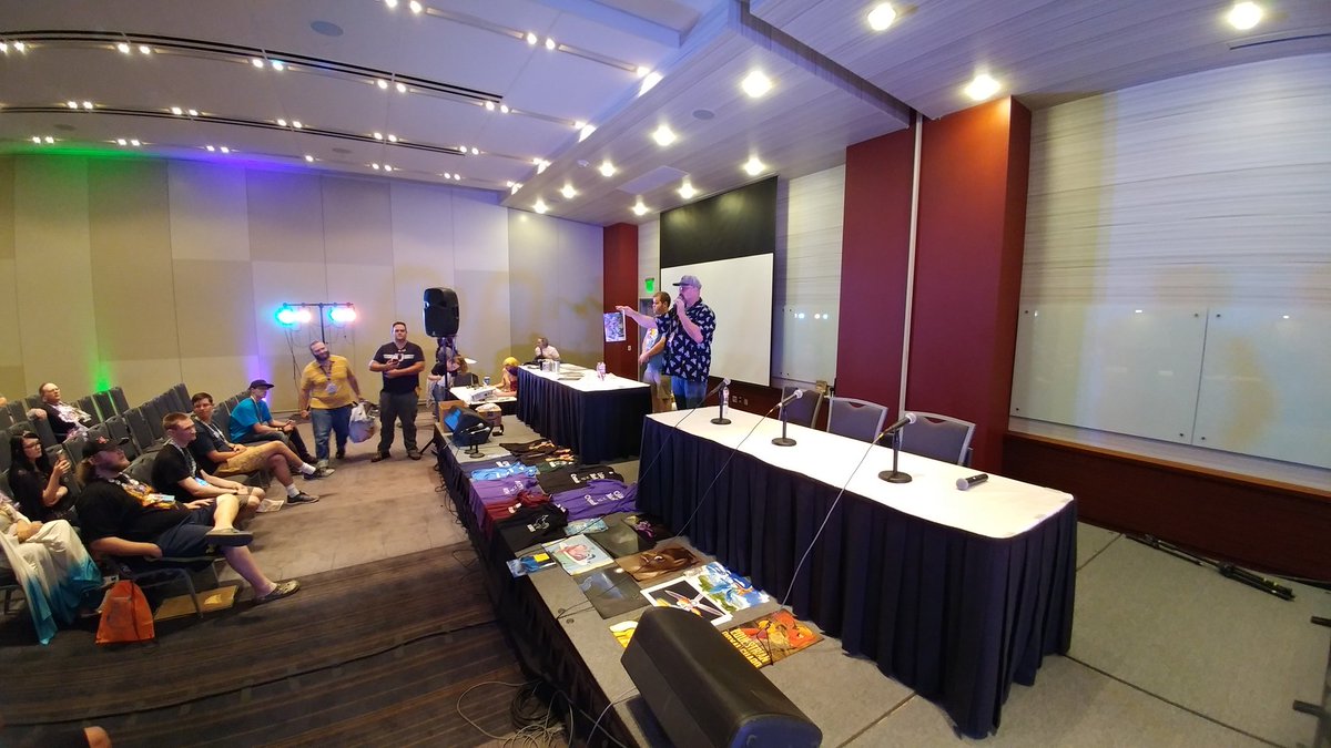 Crystalmtpnycon's tweet photo. The charity auction is underway right now in Mane Hall! #CMPC2018 https://t.co/PkPvznKwKq