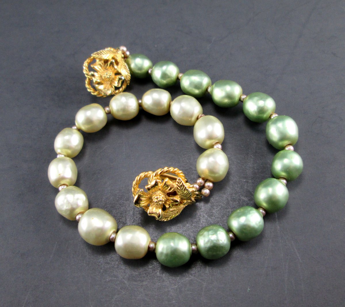 SecondhandNel's tweet photo. 10% off during our Labor Day sale!  Vintage Green Two Tone Bead Beaded Sweater Guard Gold Tone Hook 50s Mid Century at SecondhandNel  https://t.co/d9rueezY72 via @Etsy #LaborDayWeekend #jewelry https://t.co/63sfkFukFe