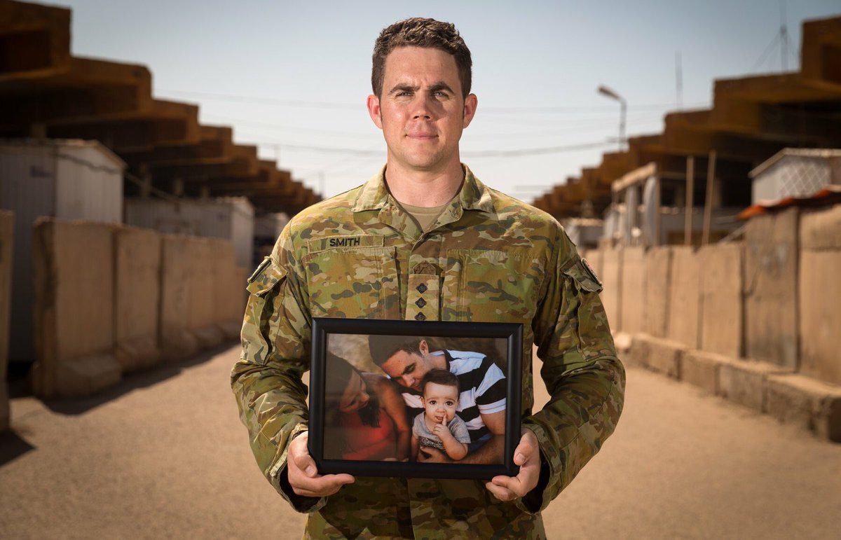 Happy Father’s Day to all fathers, especially those currently serving near &amp; afar. Your families await your safe return. For every serving Australian, there's more than one life at stake. <a href="/AustralianArmy/">Australian Army</a> CPT Evan Smith, with a photo of his son, @ Taji Military Complex, Iraq.