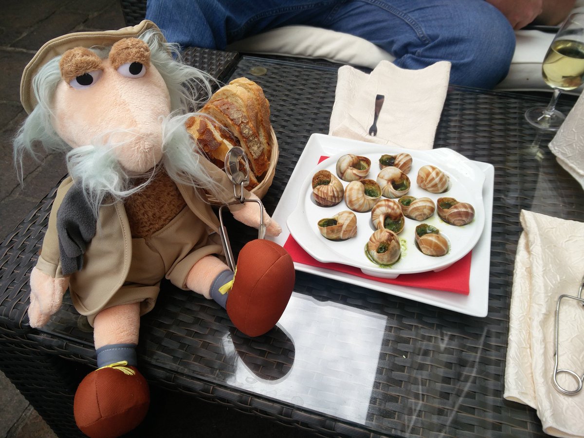_TravelingMatt_'s tweet photo. Enjoying a local french delicacy of snails and tasty white wine! I'll have to tell Red about these when I get back! #Annecy #France https://t.co/6Jhtuz71Q3