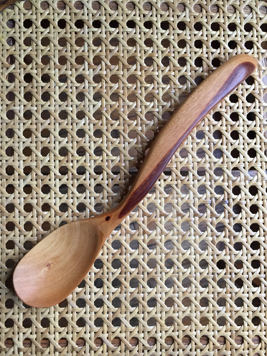 Found another piece of Mopani. This cooking, serving spoon is shorter than my usual at 9”.  It sits on a very old chair I saved from the dump and re-caned and restored. #mopani #mopaniwood #cooking #serving #spoon #woodenspoon #handcarved #africanwood #restoredfurniture #antique