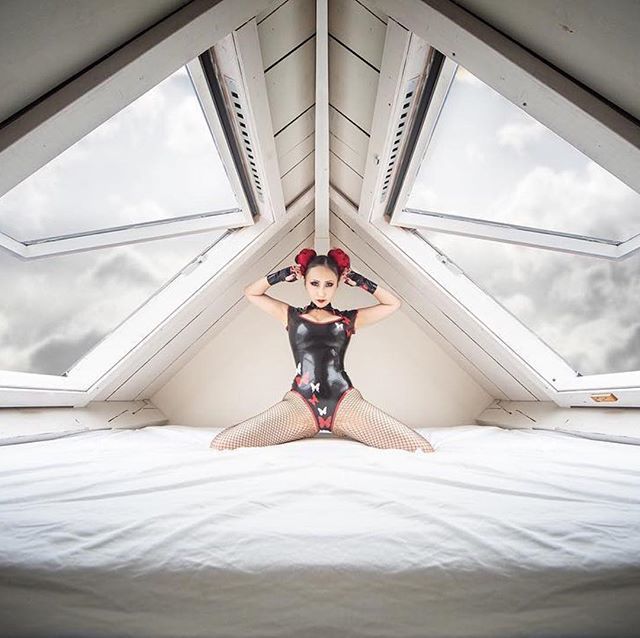 #Repost Photographer @thomasburggraf
・・・
Over the rooves of Amsterdam
@mistress_hibiki wearing our Butterfly