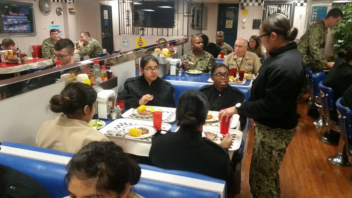 JBHSNJROTC's tweet photo. #JBHSNJROTC JBHS cadets experiencing for the very first time life on board the U.S. Navy ship USS Emory,  seen here having lunch with members of its crew. https://t.co/iO5wd3Dsk1