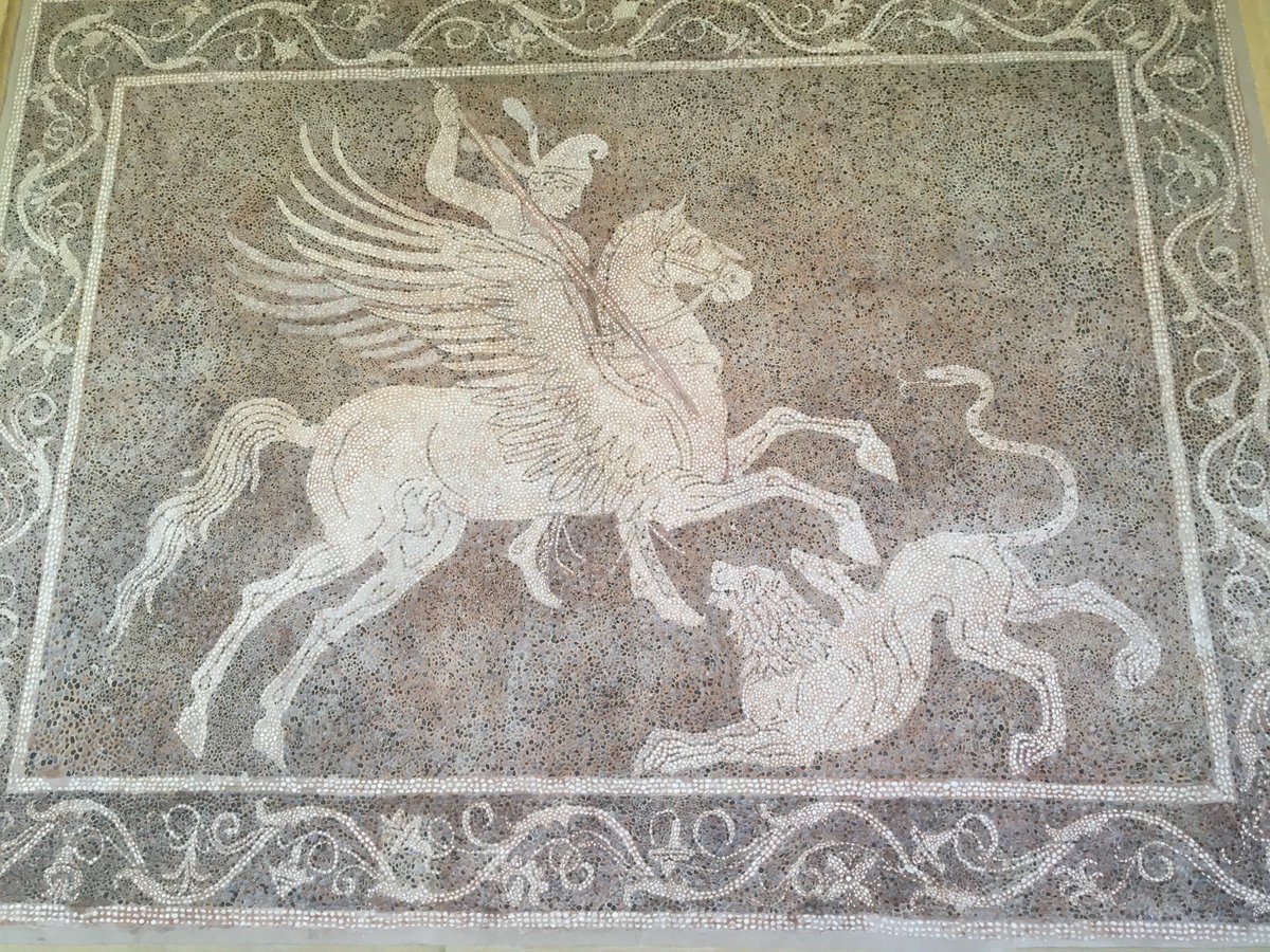 Sarah404BC's tweet photo. #Andron #Mosaics from #Rhodes Akropolis 

NB #Griffin C3rd BC = transitional techique

Central Griffin panel - new technique of artificial tesserae (cut stone)

Border -  older natural pebble and shell tesserae.

Wall displays in garden of #Rhodes Archaeological Museum https://t.co/ylH7EyWcP5