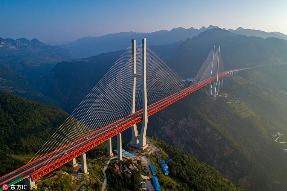PDChina's tweet photo. Magnificent! Known as the world’s “Bridge Museum,” southwest China’s Guizhou province is home to some of the world’s most impressive bridges, including truss-type combination arch bridges, large-span cable-stayed bridges, and large-span suspension bridges. https://t.co/jjij9dno9a
