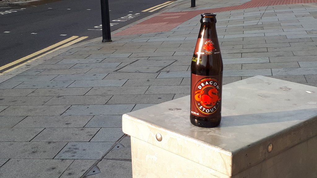Thanks to whoever left the half empty bottle of Dragon Stout on top of the bin. I'd give it 7/10