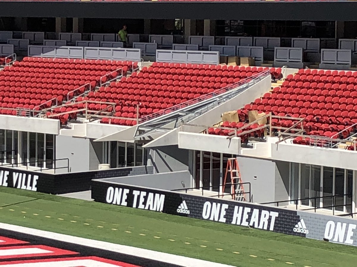 howielindsey's tweet photo. Work continues at @UofLFootball Cardinal Stadium. The final few seats are being installed and the railings, paint and graphics are happening as we speak. #LaborDay https://t.co/KeKV8IYRUl