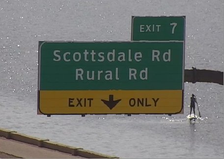 ArizonaDOT's tweet photo. A paddleboarder took the Tempe Town Lake exit earlier this morning. Enjoy your Labor Day https://t.co/yWofIG035a
