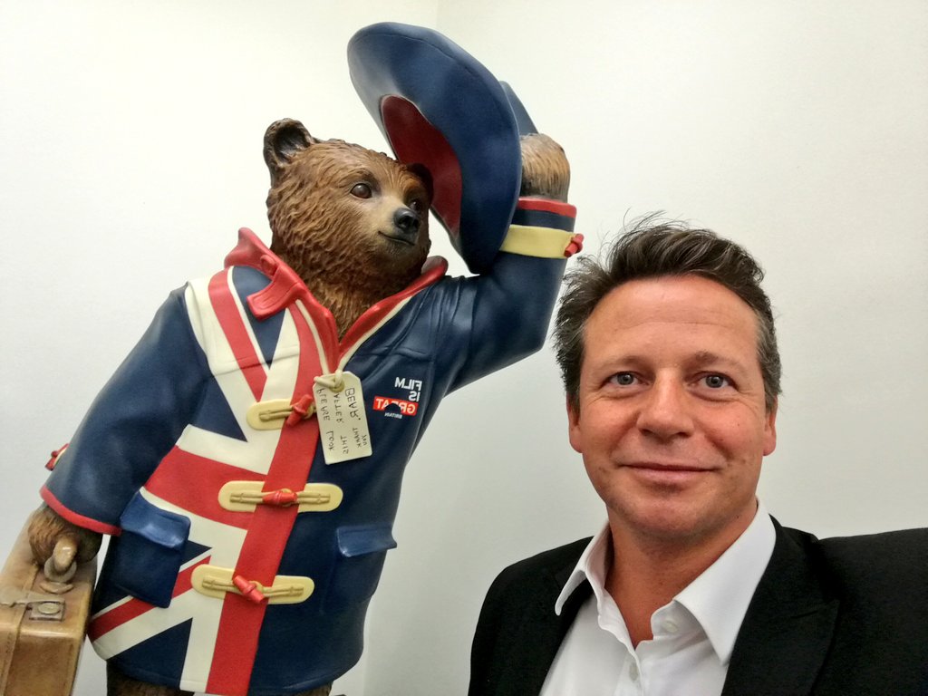 HuddlestonNigel's tweet photo. With the Paddington Bear designed by Stephen Fry at #DCMS for the #paddingtontrail and celebrating the UK Film Industry. #filmisGREAT https://t.co/0GHGGi8GSo