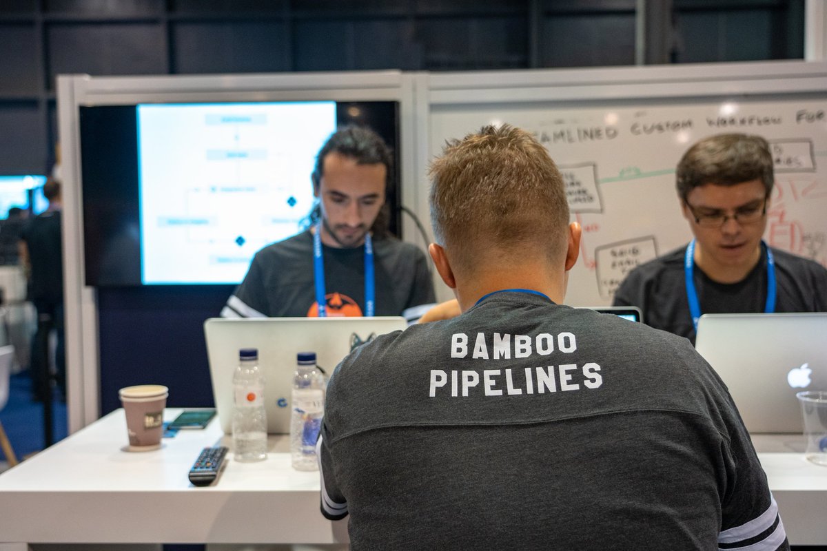 jeffthms's tweet photo. Bamboo Pipelines is heads down coding away, the coffee and waters are flowing #AtlassianSummit #ShipItLive https://t.co/2D25gKbRqz