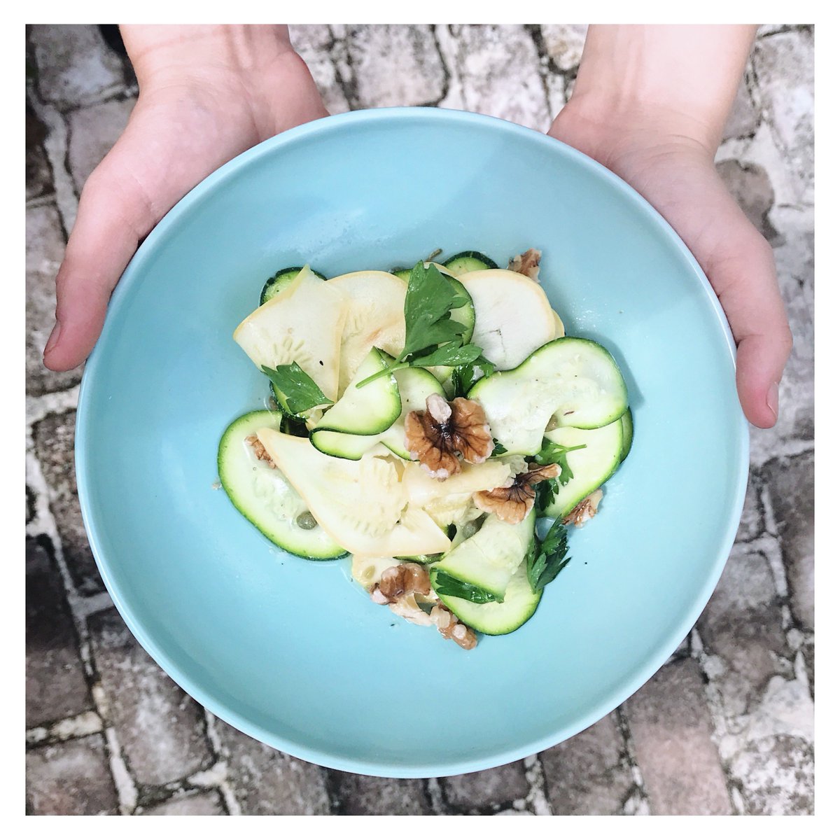 How 'bout our new Summer Squash Salad to keep summer goin' a little while longer?! Local squash and zucchini, walnuts, capers, lemon, olive oil, and parmesan cheese. Yum! #basickitchen