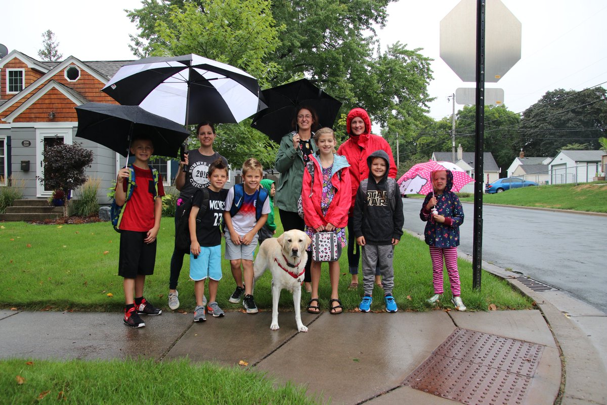 SLPublicSchools's tweet photo. Welcome back to school! It's DAY ONE in St. Louis Park! Despite some off and on rain showers, it was great to see teachers, staff, families and community members out supporting our students this morning! #SLPDayOne #SLPspirit #ChildrenFirst https://t.co/QdWbCwcmAb