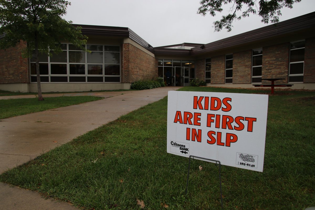 SLPublicSchools's tweet photo. Welcome back to school! It's DAY ONE in St. Louis Park! Despite some off and on rain showers, it was great to see teachers, staff, families and community members out supporting our students this morning! #SLPDayOne #SLPspirit #ChildrenFirst https://t.co/QdWbCwcmAb