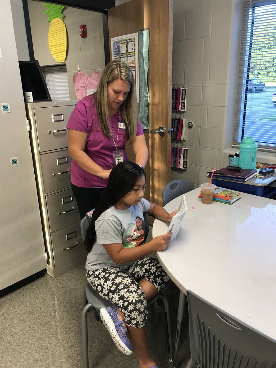 TiffanyGroce's tweet photo. Books and Braids day 1 is complete! It is such a sweet time to listen to kids from all grade levels read while we braid their hair. Thankful @TaliaDaniel2nd is doing this with me. 💕 @JCElem_RCS https://t.co/eHQQwV5Ppj