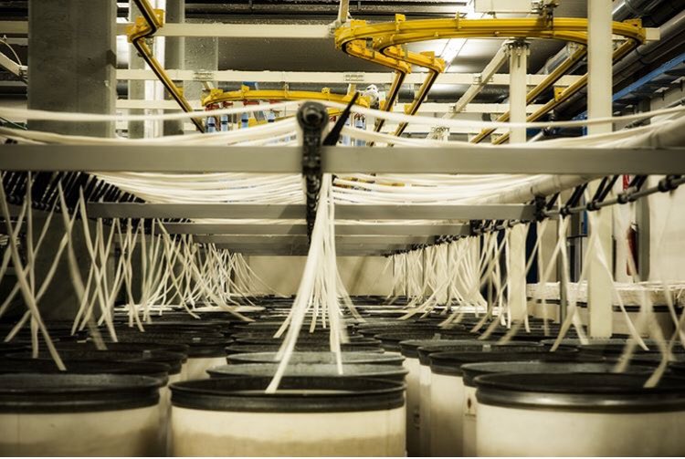 Sneak peek inside the spinning room at @candianidenim in Milan, Italy. The fabric makers at this famous mill are committed to sustainability in all elements of denim production. #candianidenim #denham #denhamthejeanmaker #sustainability #italy #thetruthisinthedetails