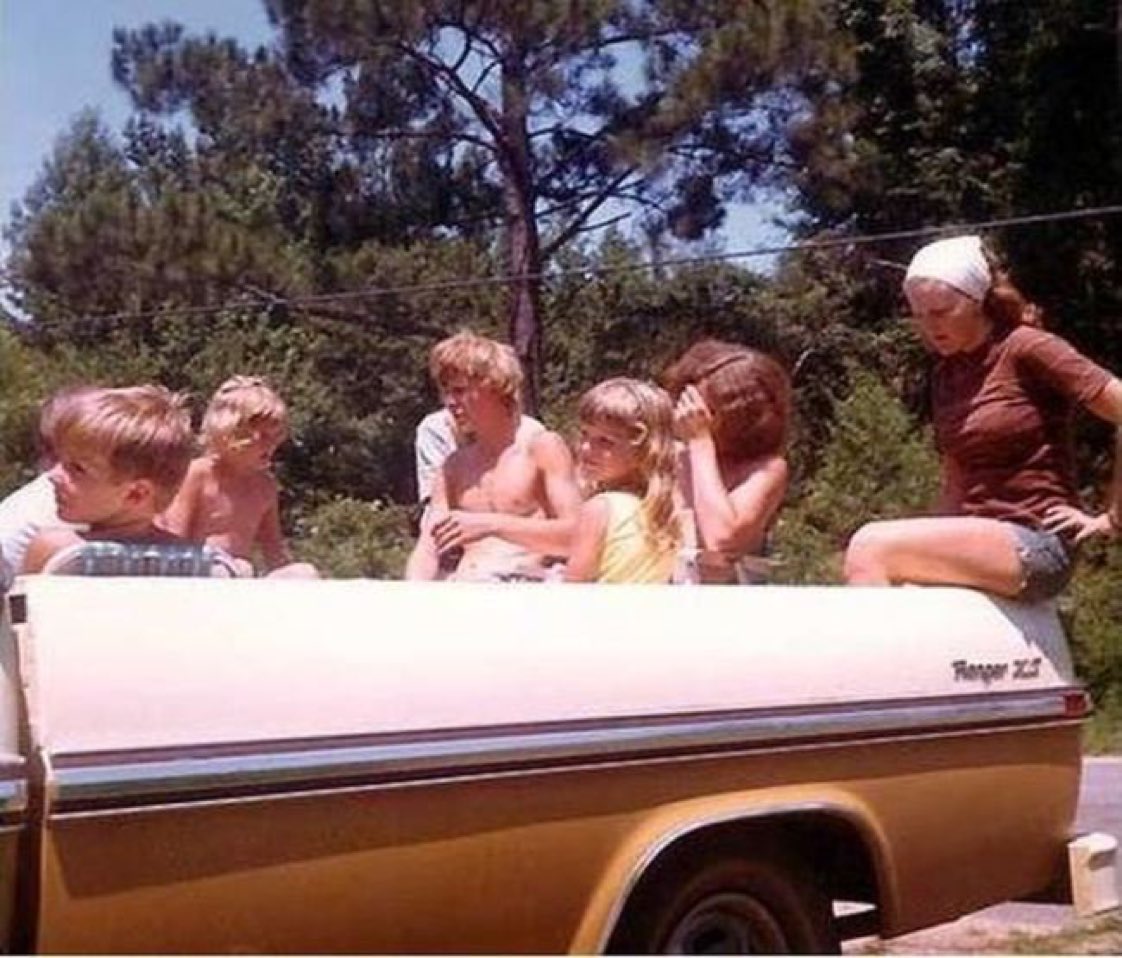 "OK, kids, all ready to go! Everyone try to hang on so you aren't expelled onto the pavement when I gun this bitch."