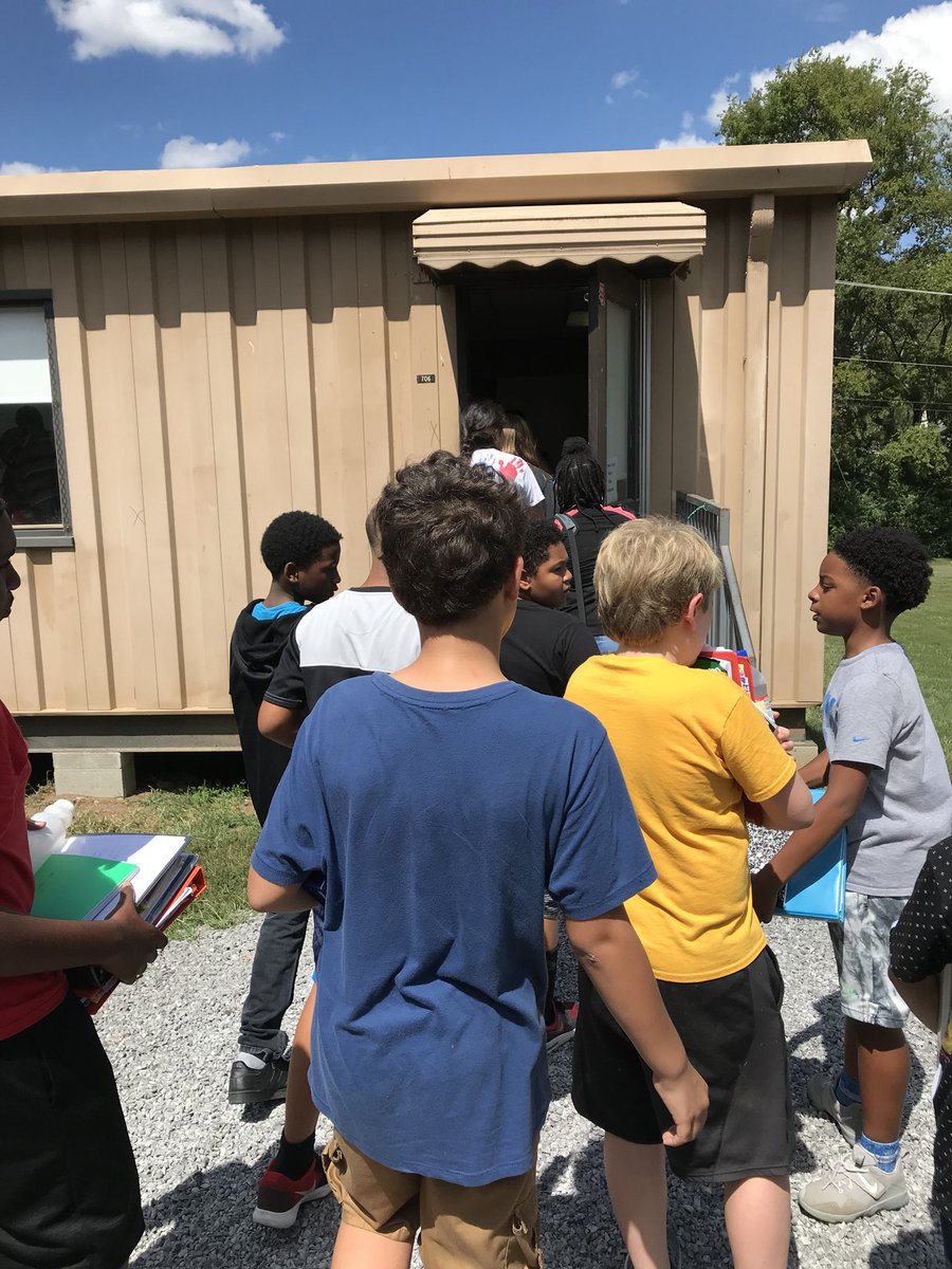 JTM_IB's tweet image. My day as a 6th grader: Now out to a portable for Social Studies. We had a challenging vocab word to decode as a table, and now we’re split into 2 groups with a teacher to #closeread about Paleolithic Age shelters &amp;amp; nomadic life. #Literacy #shadowstudent #inclusion