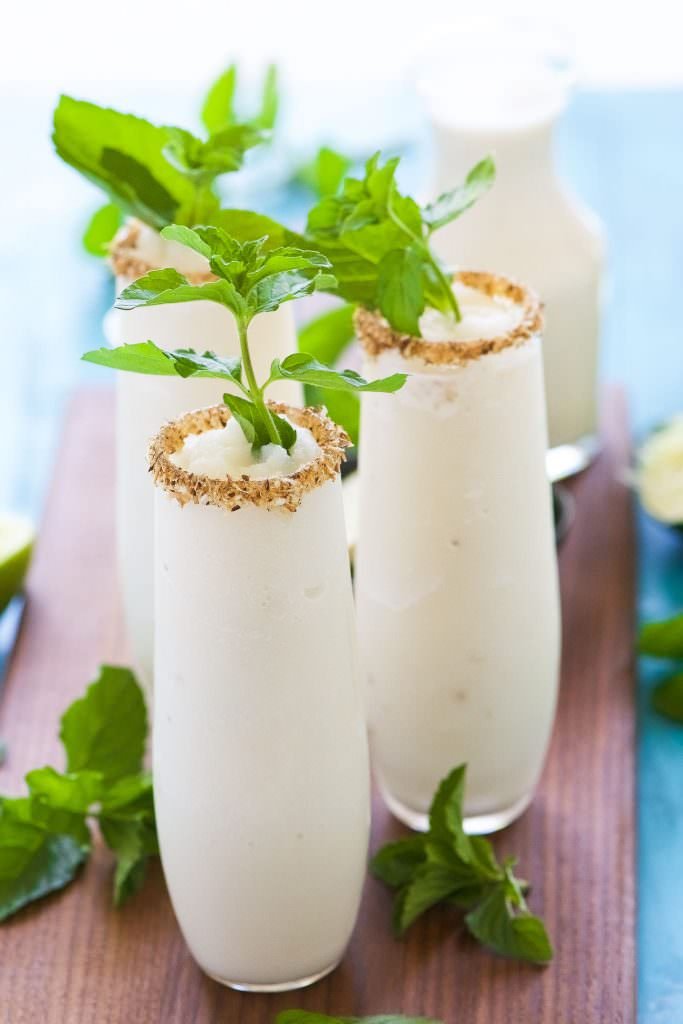 Ever had a frozen mojito? When you try this recipe at home, don't forget the toasted coconut rim! goo.gl/qY7Y1s